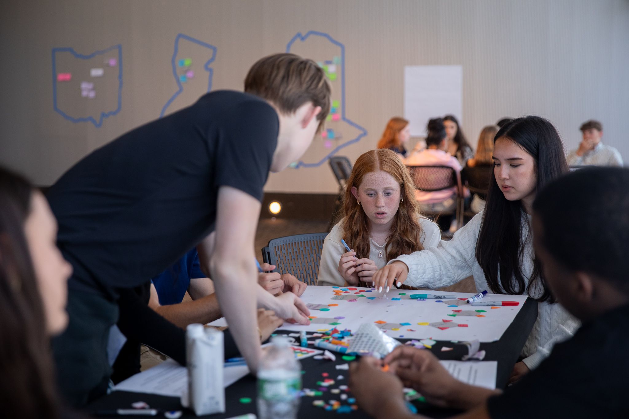 Students in an empathy interview conversation
